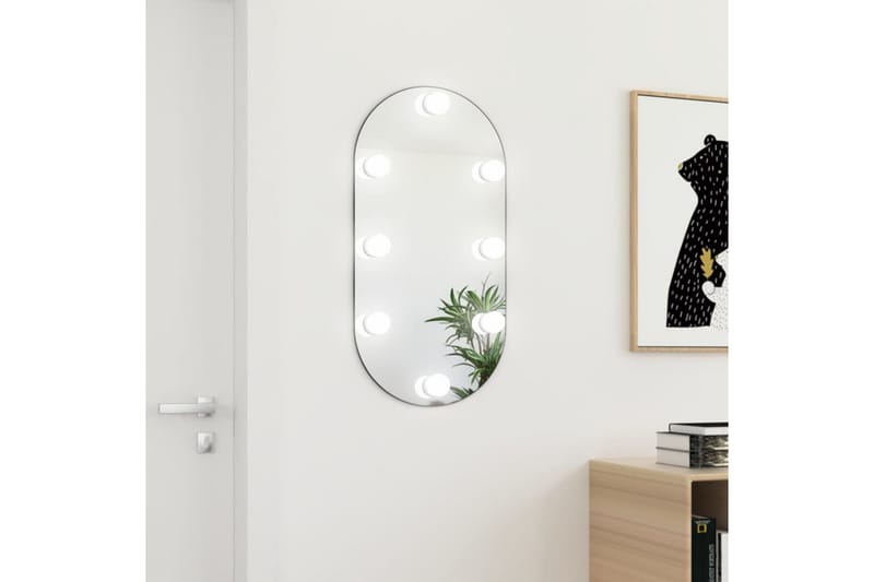 Spegel med LED-lampor 80x40 cm glas oval - Silver - Inredning - Spegel - Väggspegel